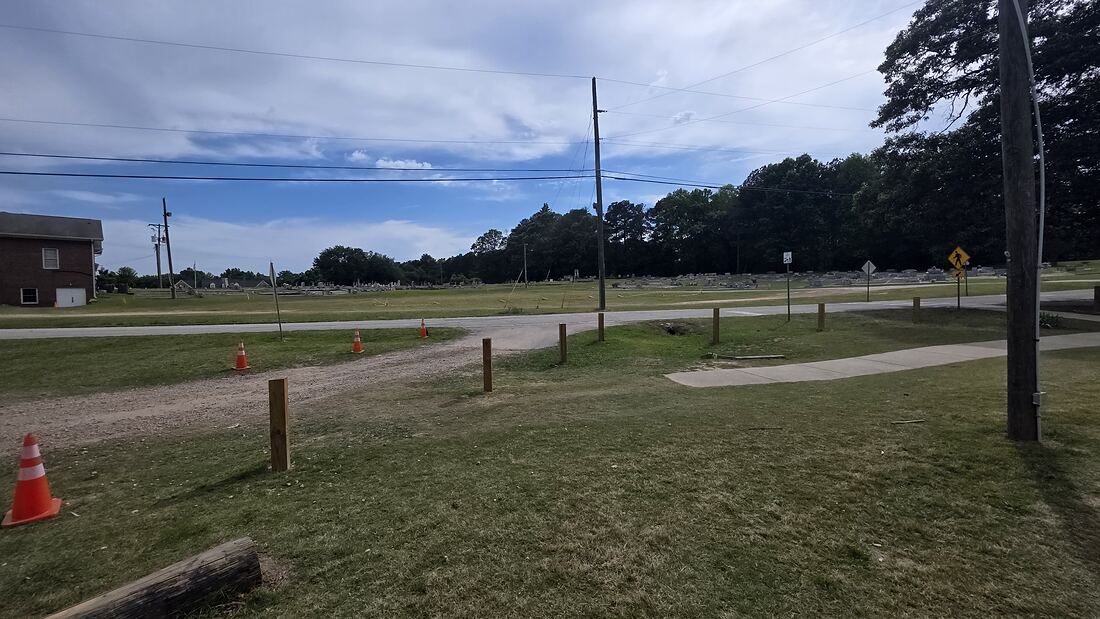 Open green space and a walking path at Bethel Park