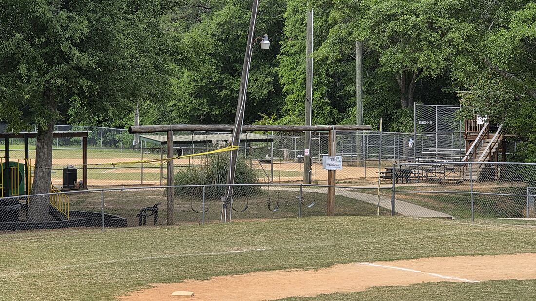A ball field at Bethel Park, with backstop and bleachers