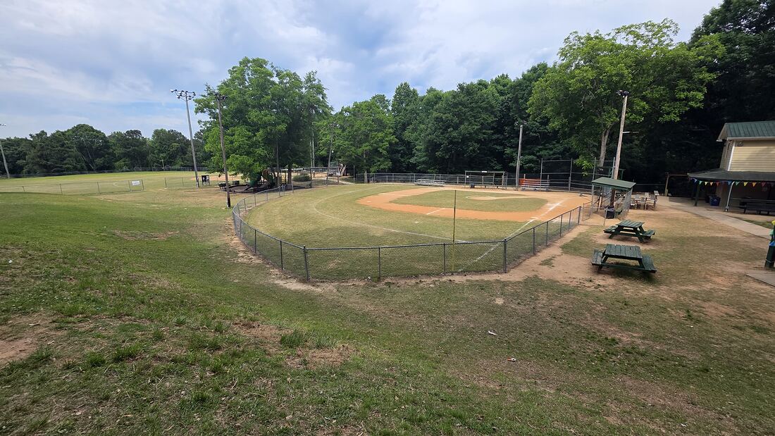 A wide view across a ball field at Bethel Park