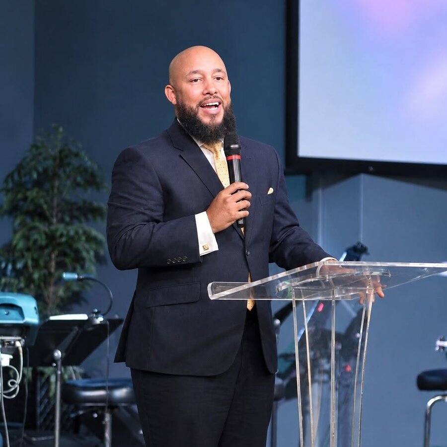 Pastor Anthony Simpson Jr. preaching during a Sunday service at Bethel Christian Church